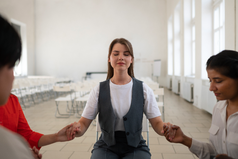 Person experiencing past life hypnosis for trauma release