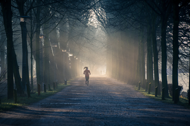 Image of a glowing path emerging from fog