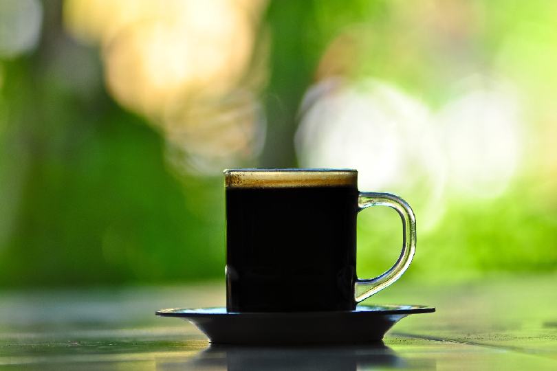 Image of a coffee cup turned over with grounds visible (Coffee Cup Reading in Andheri West for Emotional Clarity)