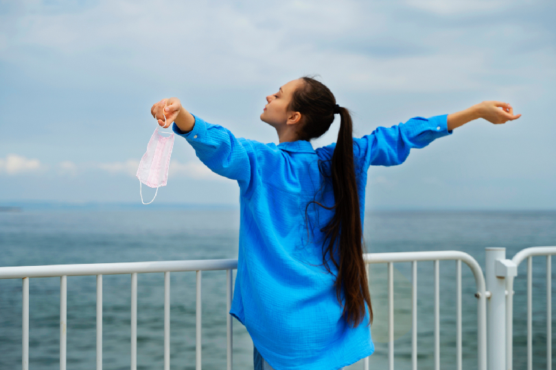 Image of a person surrounded by soft blue and white light (Angel Healing in Andheri West Mumbai for Inner Peace