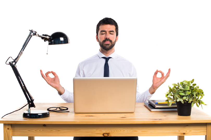 A professional man breaking through a career plateau with meditation