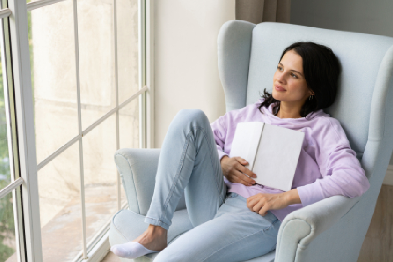 A peaceful woman experiencing clinical hypnotherapy for anxiety relief.