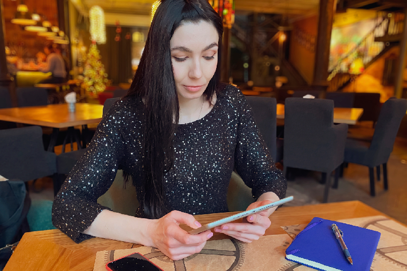 An entrepreneur checking the numerology for phone number to attract clients.
